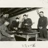 Student aviator assembling a Lewis gun blindfolded.