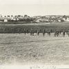 Troops advancing in open formation.