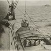 Mines being taken aboard a mine-layer.