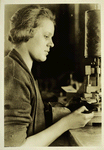 Woman drill press operator