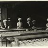 Group of women sorting chocolates