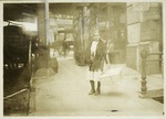 A young girl on West 3rd Street delivering flowers made at home during school hours