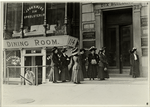 Group of women workers gathered outside the Dix Building, where they work on millinery][variant of #20]