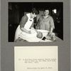 A visiting nurse showing Jewish mother how to care for the baby, East Side, New York, 1925