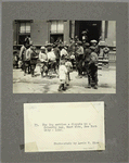 The Cop settles a dispute in a friendly way, West Side, New York City, 1910