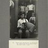 Evensong: steelworker in Homestead, Pa. entertains his boarders after the day's work, 1909