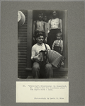 Evensong: steelworker in Homestead, Pa. entertains his boarders after the day's work, 1909