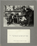 Bootblacks fill up spare time pitching pennies, New York City -- 1915.