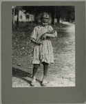 Rosie playing with her doll, February 1913.