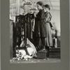 This little girl is so small she has to stand on a box..., December 1910
