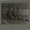 Boy braking on motor train in coal mine..., September 1908