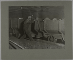 Boy braking on motor train in coal mine..., September 1908