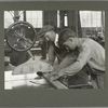 An apprentice working at a properly safeguarded "buzz saw," 1915
