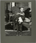 A young boy starting out for the factory..., 1920