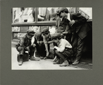 Newsboys and bootblacks shooting craps, 1912