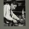 A boy making a wrought iron lamp in a Brooklyn school, 1925