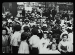 Work with schools, Hudson Park Branch : librarian surrounded by sea of children, ca. 1910s, Hudson Park
