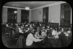 Work with schools, Rivington Street Branch : readers fill room, study room at night, 1923