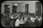 Work with schools, Rivington Street Branch : readers fill room, study room at night, 1923