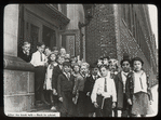 Work with schools, 67th Street Branch : children outside entrance to library, 'After the book talk - back to school,' June 1938