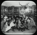 Work with schools, Webster Branch : story hour, about 1910, Miss Cheznay (?)