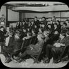 Work with schools, Yorkville Branch : Boys Club listening to story read by one of its members, 1910.