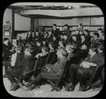 Work with schools, Yorkville Branch : Boys Club listening to story read by one of its members, 1910