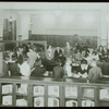 Work with schools : waiting their turn at the children's charging desk, Oct. 1923