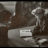 Work with schools : a 'private' lesson, child showing something in book to librarian, ca. 1920?