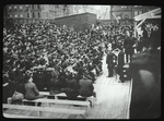 Central building, cornerstone laying : man in top hat mortaring stone