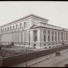 Central building, exterior views : Bryant Park and 40th street facades from 40th Street looking northeast, wagon on street
