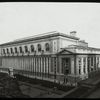 Central building, exterior views : Bryant Park and 40th Street facades from roof on W. 40th Street, autumn of 1915, buildings in background have been masked leaving sky area blank.
