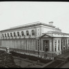 Central building, exterior views : Bryant Park and 40th Street facades from roof on W. 40th Street, autumn of 1915, buildings in background have been masked leaving sky area blank