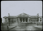 Central building, exterior views, Fifth Avenue, 1913 : night view looking along terrace and Fifth Avenue facade from the south by electric light, winter of 1913