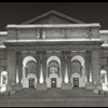 Central building, exterior views, Fifth Avenue, 1914-1916 : Fifth Avenue facade at night, portico and part of rest of the facade, lit up, July 4, 1914