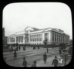 Central building, exterior views, Fifth Avenue : Fifth Avenue and 42nd street, looking southwest at street level, pedestrians, trolley, ca. 1911