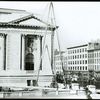 Central building, exterior views, Fifth Avenue : placing flagpole in position, north flagpole