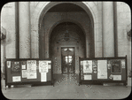 Central building, first floor lobby : looking from lobby (Astor Hall) toward exhibition hall, war posters (?) displayed on either side, ca. 1918