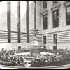 Central building, sculpture and monuments : interior court, midsummer 1912, showing fountain in center of court surrounded by plants