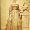 Studio portrait of unidentified  woman holding handkerchief.