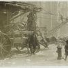 Snow removal on Mott Street, between Prince and Houston Streets.