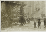 Snow removal on Mott Street, between Prince and Houston Streets.