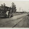 Cement concrete road. Huntington Drive, L. A. Co., Cal. Smoothing surface of tamped subgrade, 1912.  (View no. 3)