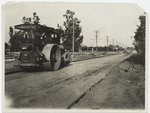 Cement concrete road. Huntington Drive, L. A. Co., Cal. Smoothing surface of tamped subgrade, 1912.  (View no. 3)