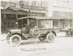 Model 15 Bevel gear type. Developed 1915.  [In front of Beach & Cloonan Drug store].