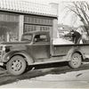 Model T 16 BA - F 28 in front of storefront: Mantei Sheet Metal Works