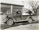 Model T 16 BA - F 28 in front of storefront: Mantei Sheet Metal Works