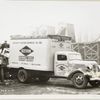 Model T-16 B-K-46; people loading furniture in Keeshin Motor Express Co. Inc. truck