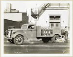 Model T 16 B - A 7; person loading tanks