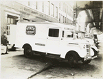 GMC van in front of State Laundry Co.
